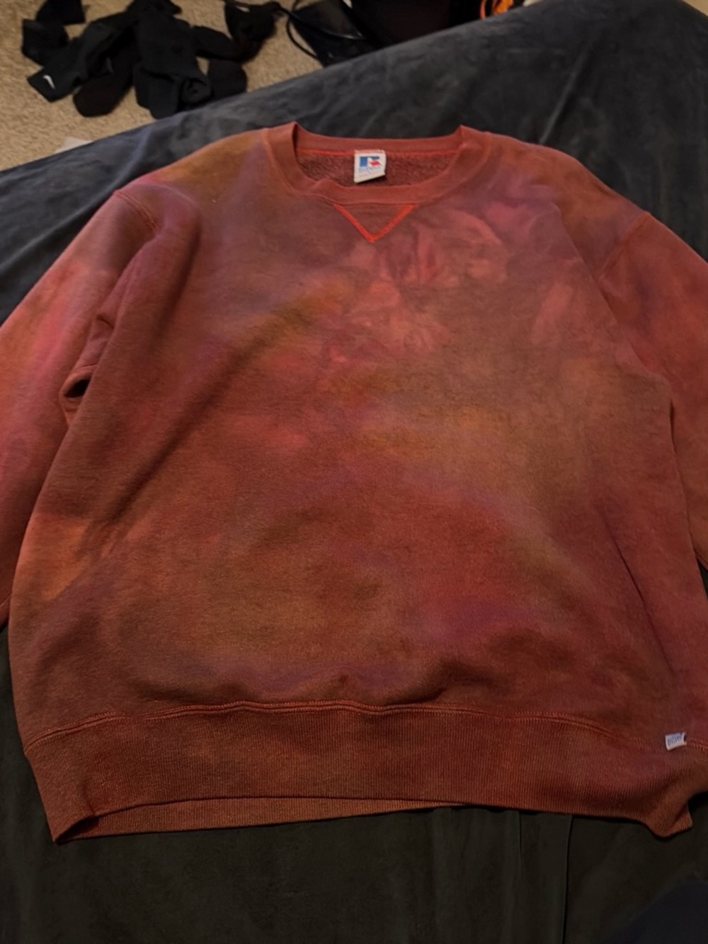 Russell Athletic Red Tie-Dye Crewneck Sweatshirt with Subtle Multicolor Accents